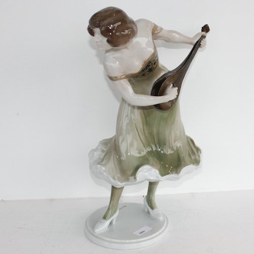 Rosenthal Figurine Signed Rudolf Marcuse: Depicting woman playing a musical instrument, small flaw, 41 cm tall