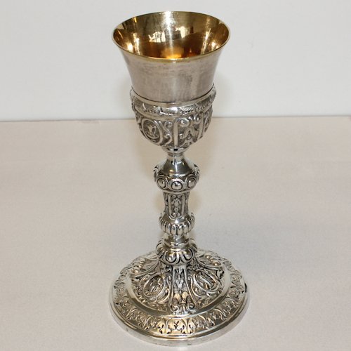 Silver Chalice 1870 Napels: Fine detail surrounding both choice base and cup depicting religious symbols, 24 cm tall