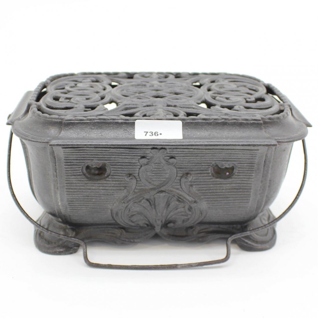 Small Cast Iron Stove or Warmer: 27 cm long.