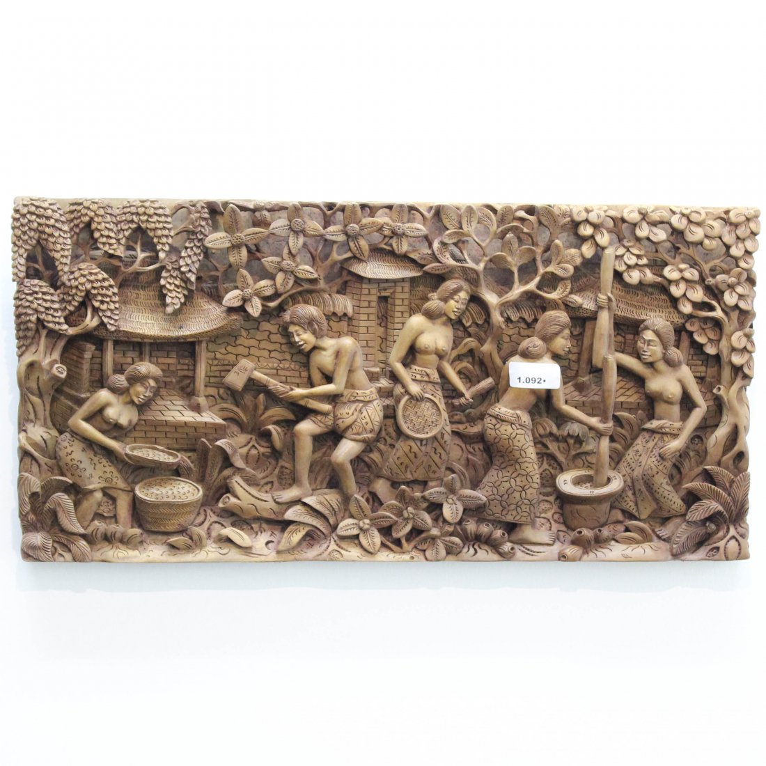 Carved Indonesian Sculpture: 24 cm long.