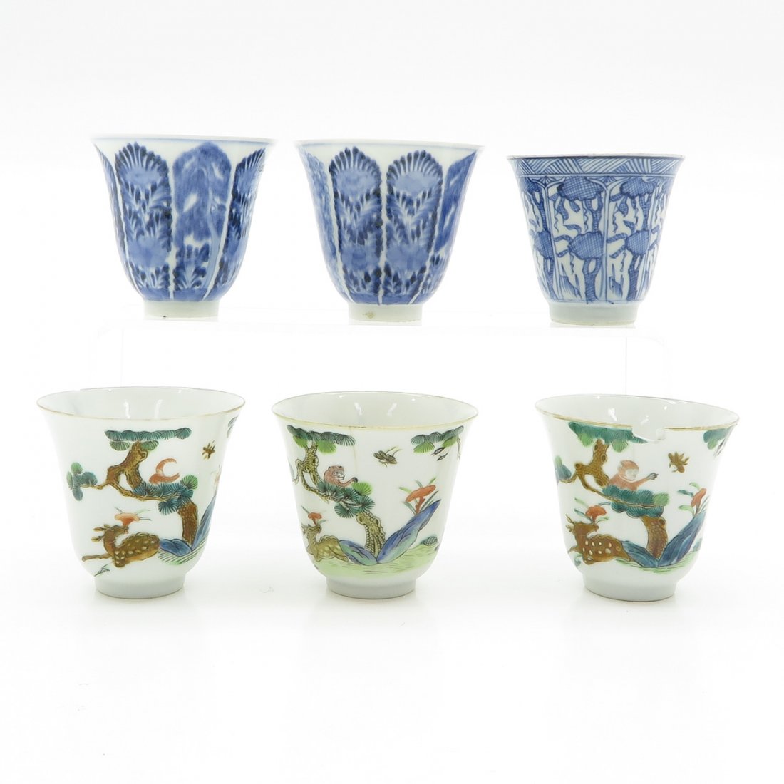 Lot of China Porcelain Cups: 6 pieces, tallest is 9 cm. This lot is in diverse condition. There are item/s that have chips, cracks, hairlines and/or restorations.