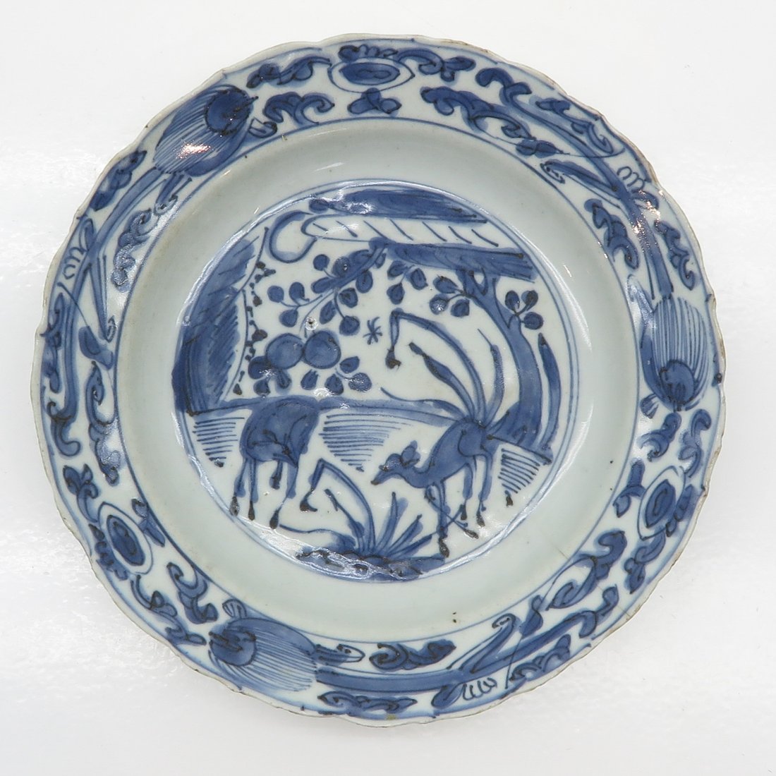 China Porcelain Ming Dynasty Plate: 21 cm. in diameter, hairline and chip.