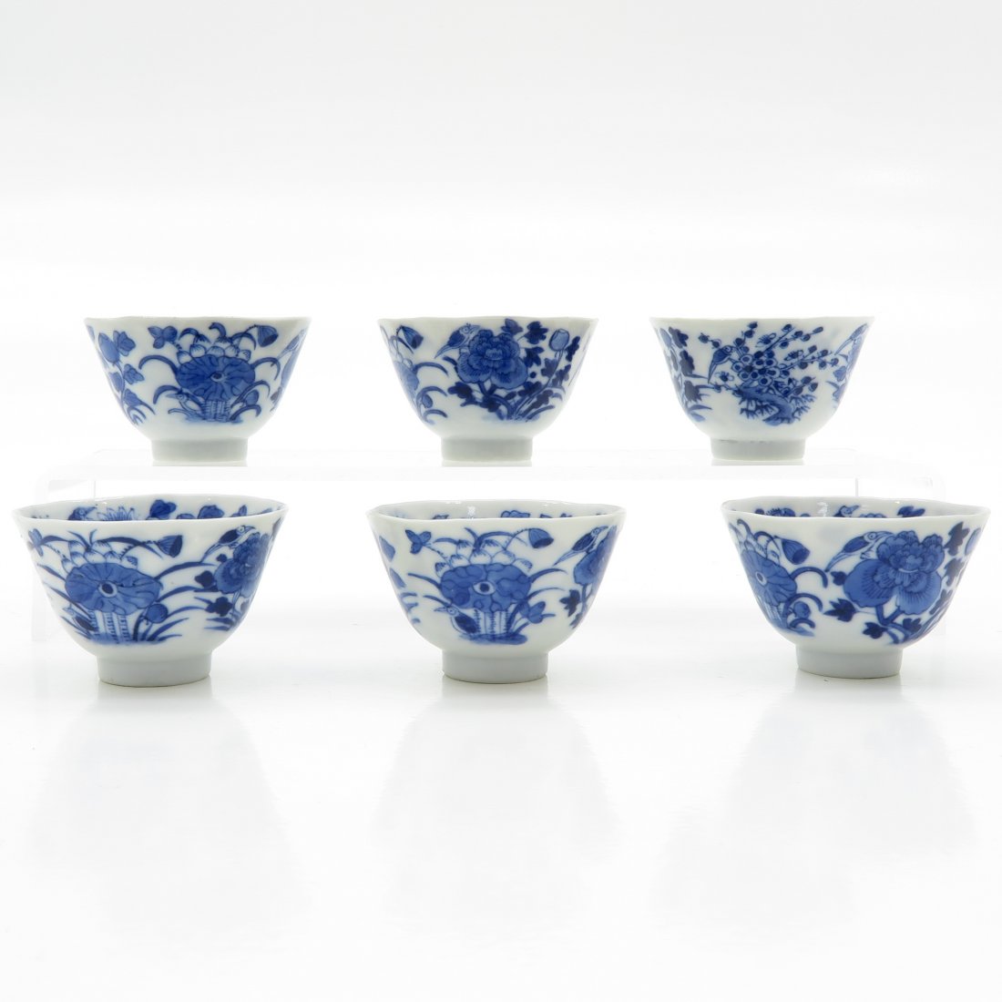 Lot of 6 China Porcelain Cups: Marked with 4 characters, 7 cm. in diameter, 1 cup with hairline.
