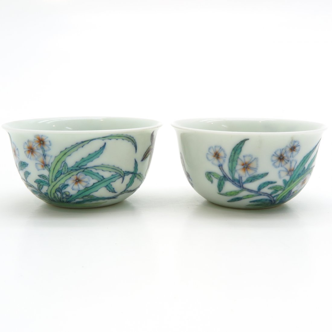 Lot of 2 China Porcelain Cups: Marked with double ring and 6 characters, 7 cm. in diameter.