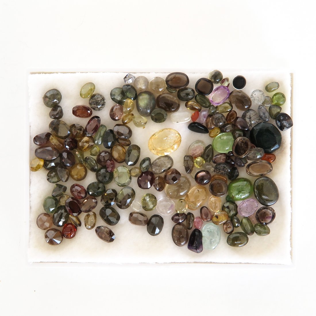 Diverse Lot of Zircon Gemstones Approximately 160 CTW: 160 carat total weight.
