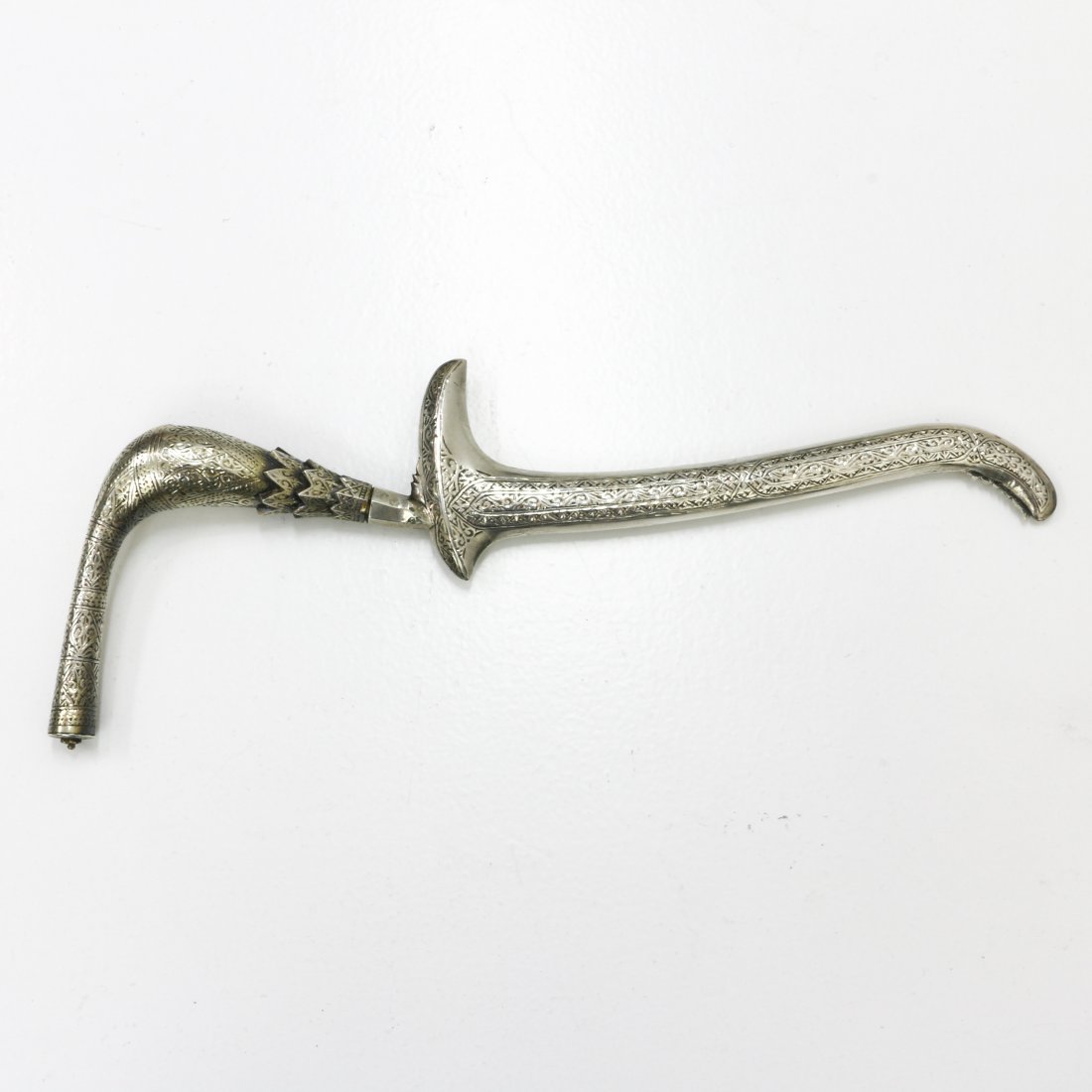 Silver Rencong: Atjeh, remnants of ormolu on the handle, 27 cm. long.