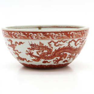 China Porcelain Bowl: Decor and dragons in clouds, 27 x 12 x 27 cm., restored.