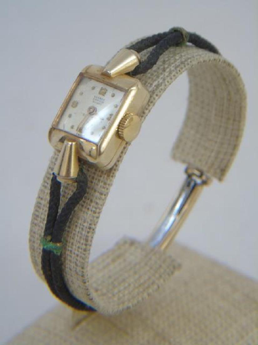 Ulysse Nardin Suisse Yellow Gold Deco Style Watch: Ulysse Nardin Suisse Yellow Gold Deco Style Watch. Tests at 14kt, not hallmarked. Bracelet hardware is plated / gold filled.