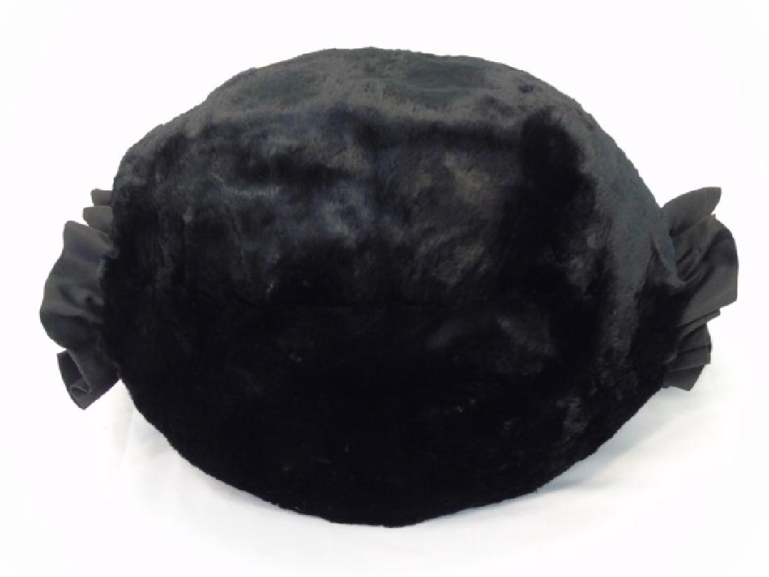 Sheared Beaver Black Muff, Ruffled Fabric Edge: Sheared Beaver Black Muff - plush, with a Ruffled Fabric Edge on each end. Measures 12 x 14 inches.