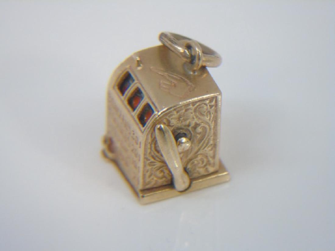 Estate 14k Yellow Gold Slot Machine Pendant Charm: Estate 14k Yellow Gold Slot Machine Pendant Charm. Hallmarked on bottom. Measures nearly .75 of an inch with loop.