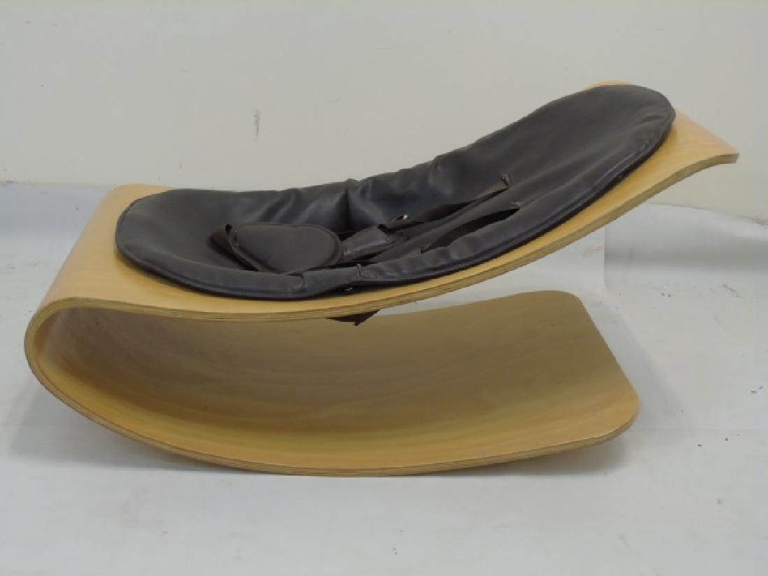 Contemporary Wood & Leather Child Rocking Chair: Contemporary Wood & Leather Child Rocking Chair. Measures 17 x 28 x 17 inches.