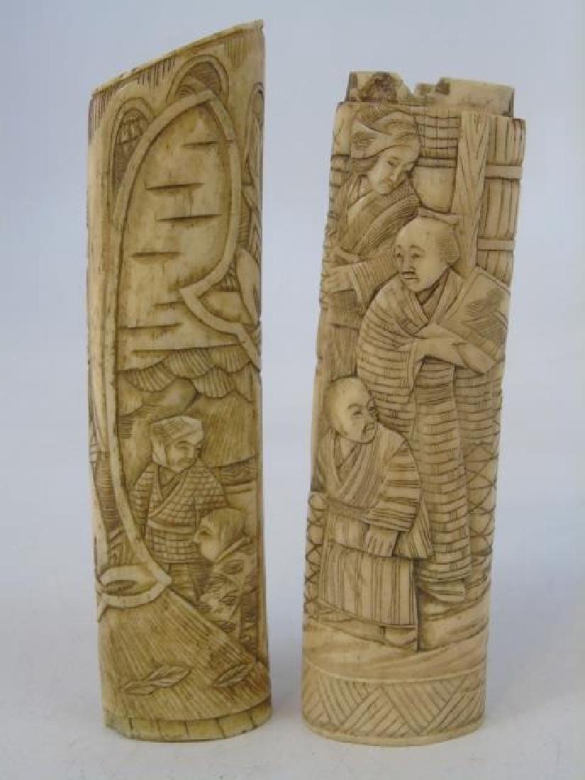 Pair Antique Carved Chinese Bone Statues: Pair Antique Carved Chinese Bone Statues. Ox or cow bone carved in the round with ink was to bring out details. Showing robed figures / scenes of domestic life. Each measures approximately 5 inches.