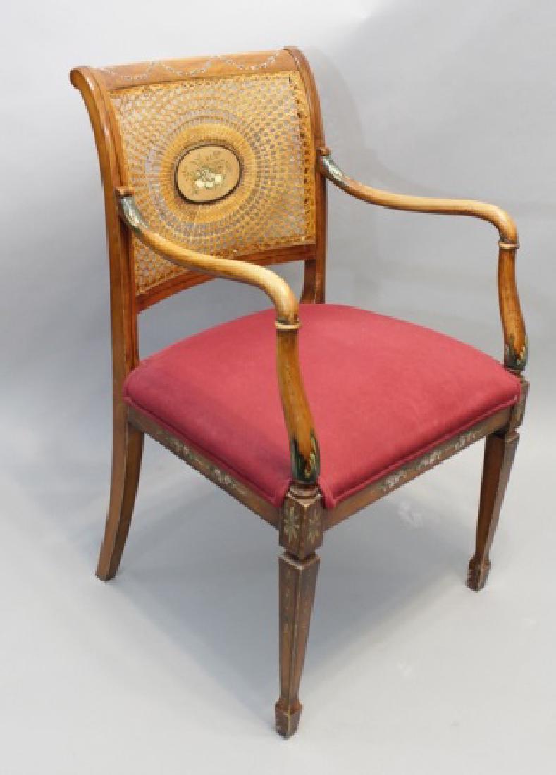 Adam-Style Painted Chair with Caned Back: Adam-Style Painted Chair with Caned Back and red upholstered cushion, having a painted musical scene at the center of the back. Measures 35 x 22 x 19 inches.