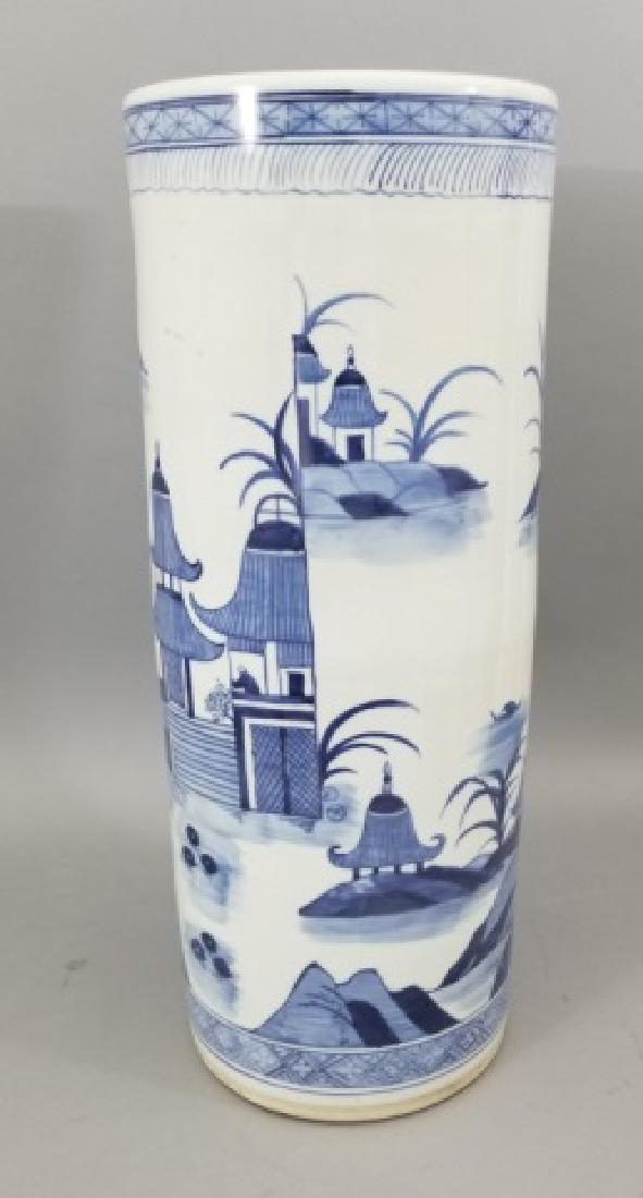 Chinese Canton Blue White Porcelain Umbrella Stand: Chinese Canton Blue & White Porcelain Umbrella Stand. Hand painted blue design against white porcelain background. Measures 24 inches in height.