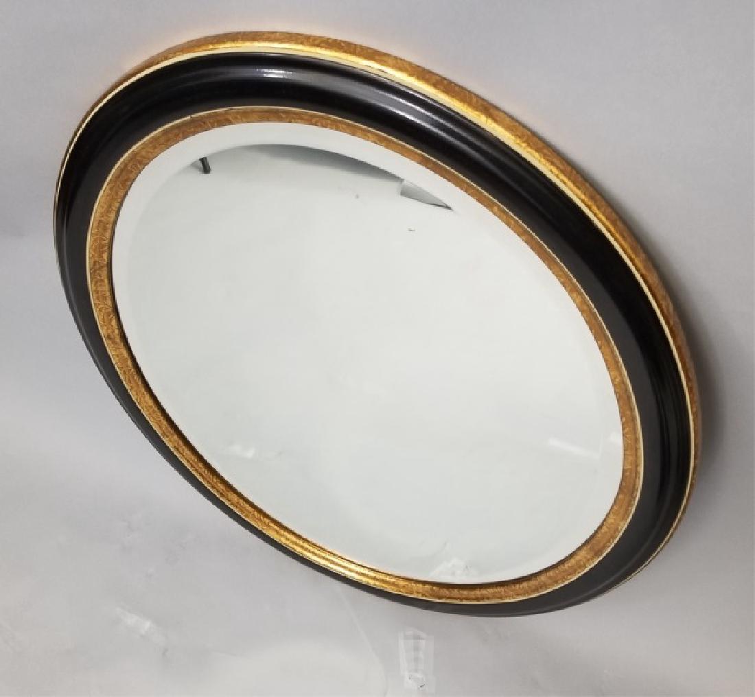 Contemporary Oval Mirror in Black & Gold Frame (1 of 6)