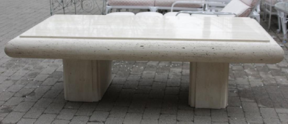 Carved Travertine Coffee Table in Peach & Cream: Carved Travertine Coffee Table in Peach & Cream Tones. Two piece base and one piece top. Measures 20 x 66 x 38 inches.