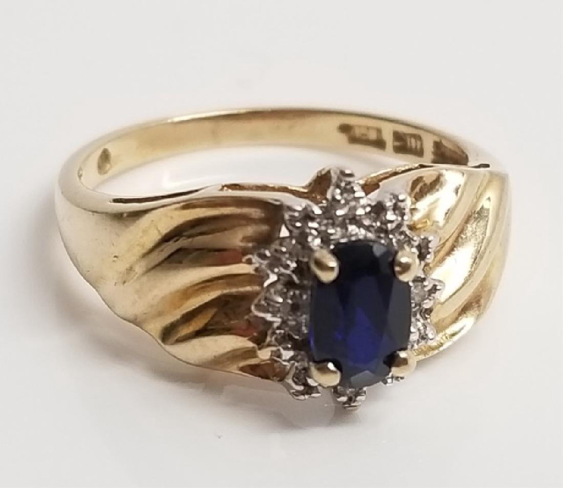 10k Gold Swirl Ring with Oval Sapphire & Diamonds (1 of 7)