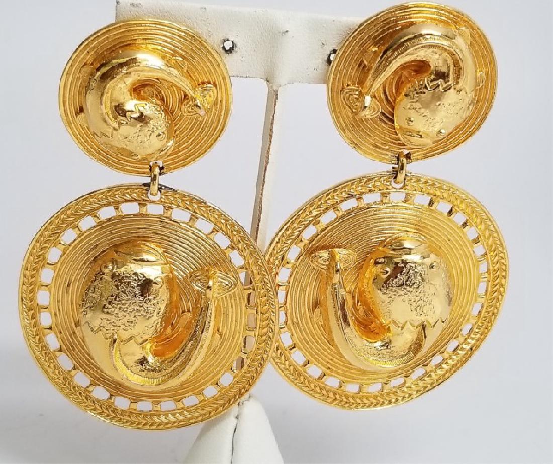 Makeda Gilt Disk Earring Pendants with Koi Fish: Makeda Gilt Double-Disk Earring Pendants with Koi Fish design - signed; having French clip-backs. Circa 1990. Measure 3.5 inches long.