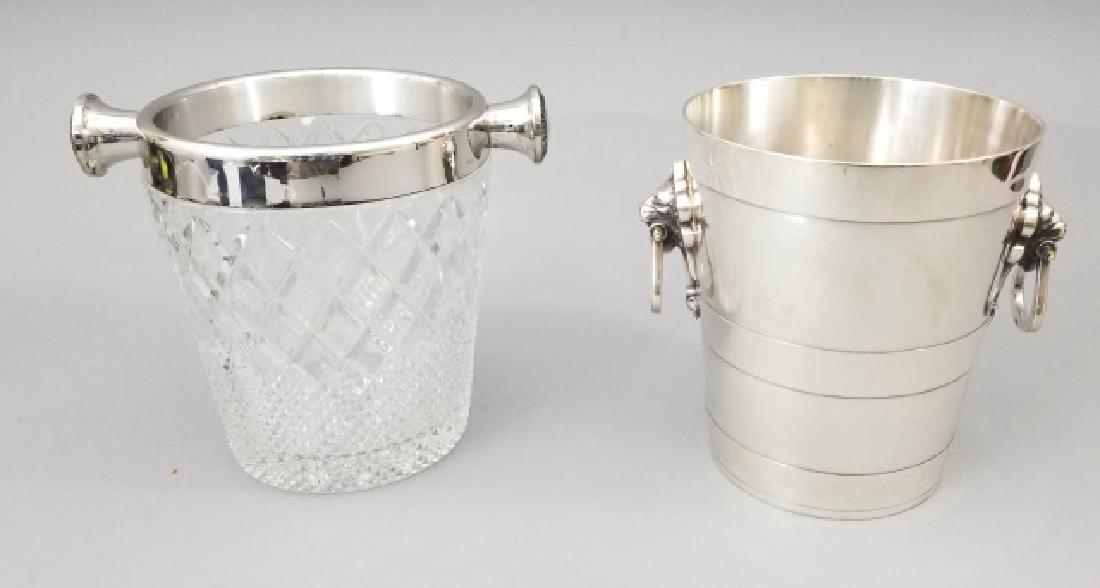 2 Silver Ice Buckets or Wine Coolers with Handles: 2 Silver Ice Buckets or Wine Coolers with Handles. Lion Head handle bucket measures 8 inches tall.