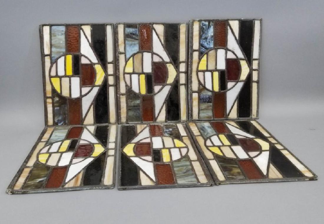 6 Antique Leaded Glass Panels in Geometric Pattern: 6 Antique Leaded Slag Glass Panels in Geometric Pattern. No wood frames, only glass panels. Each measures 9.5 x 14 inches.