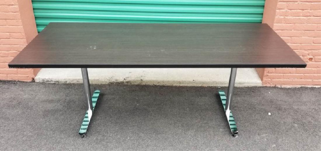 Versteel Brattice Faux Wood-Chrome Table (1 of 5): Versteel Brattice Faux Wood & Dark Chrome Table (1 of 5).Having folding legs. Measures 29.5 x 32 x 78 inches.