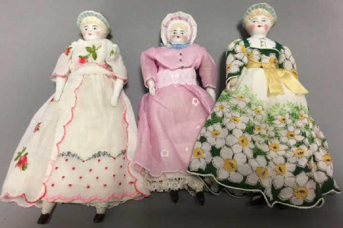 Three Antique Bisque Dollhouse Doll Heads w Bonnets (1 of 5)