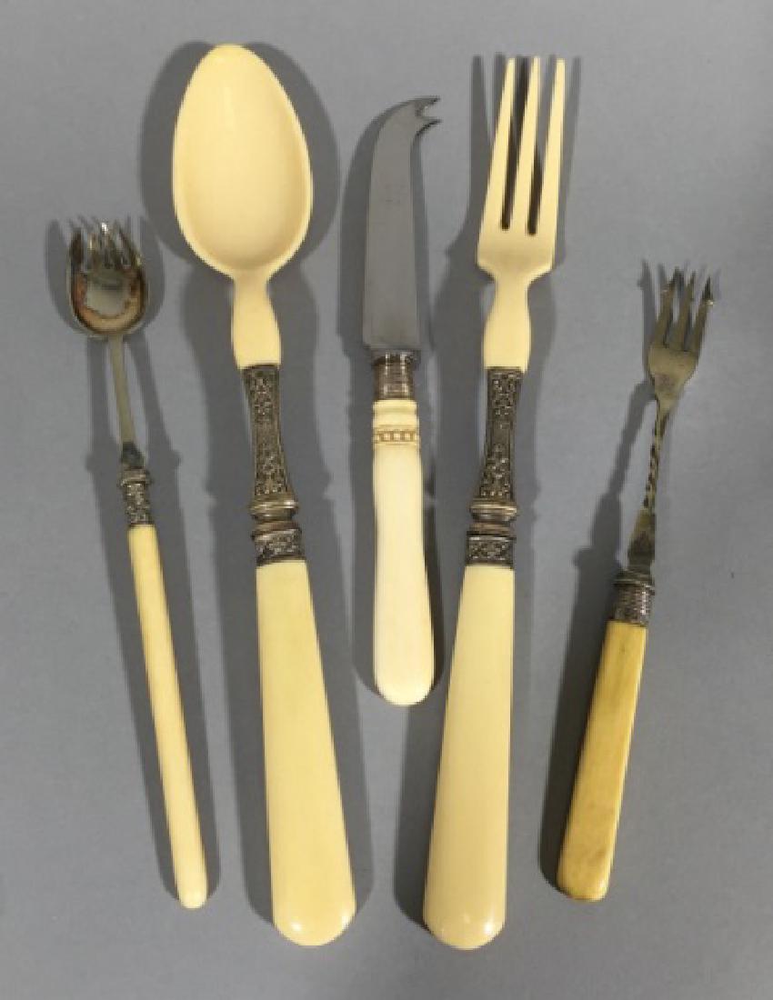 Antique Sterling, Silver Plate, Faux Bone Utensils: Antique Sterling, Silver Plate, Faux Bone Utensils. Serving items. Largest measures 10.5 inches in length.