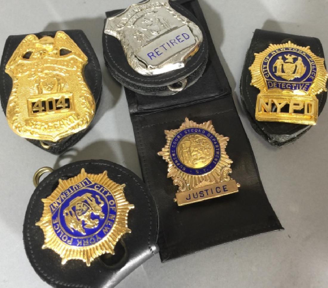 5 Obsolete New York City Law Enforcement Badges: 5 Obsolete New York City Law Enforcement Badges. Badges include: Supreme Court Justice, NYPC Lieutenant, NYPD Sergeant, Retired Silver NYPD, and NYPD Detective. All on or in leather holders. All measu