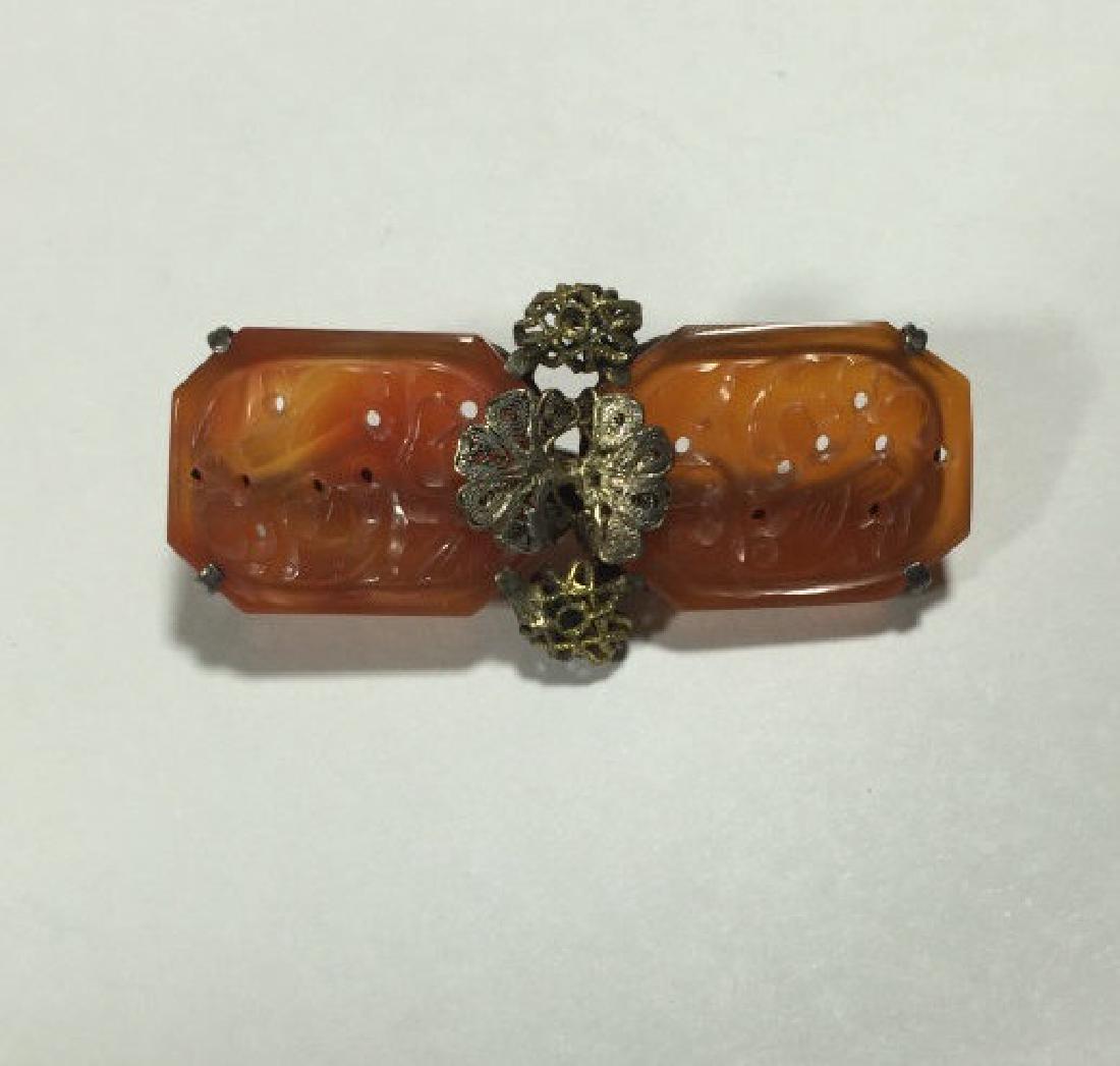 Antique Chinese Carved Carnelian & Filigree Brooch: Antique Chinese Carved Carnelian & Filigree Brooch. Measures 1.75 inches in length.
