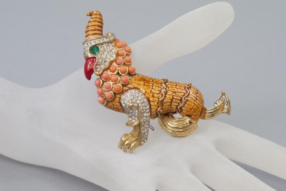 Geoffrey Beene by Kramer Large Griffin Brooch: Geoffrey Beene by Kramer Large Griffin Brooch. Enameled gilt metal, rhinestones and cabochons. Measures 2.75 x 2.5 inches.