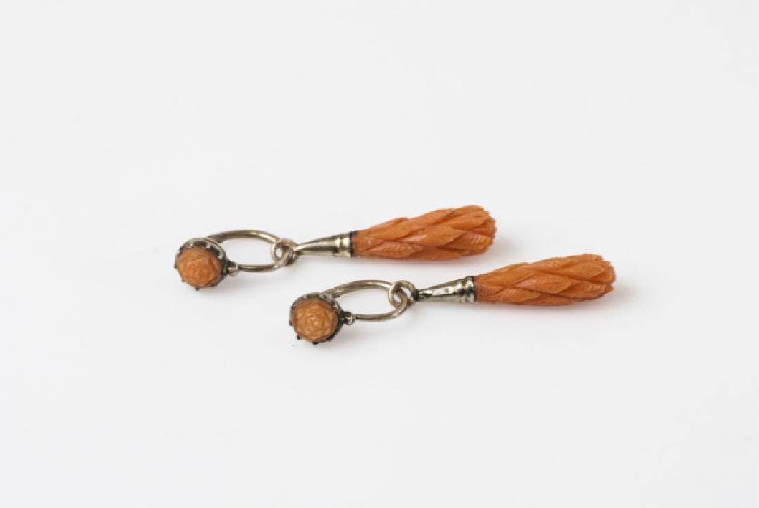 Antique English Georgian Carved Coral 10k Earrings: Antique 19th C English Georgian Carved Coral 10k Yellow Gold Earrings. Hand carved. Each measures 1.75 inches in length.