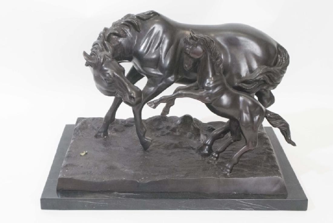 Bronze Mare & Colt Statue on a Black Marble Base: Bronze Mare & Colt Statue on a Black Marble Base. Measures 18 x 24.5 x 16.5 inches.