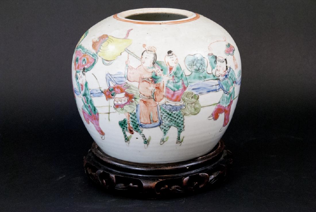 Chinese Hand Painted Porcelain Vase w Wood Stand: Chinese Hand Painted Porcelain Vase w Wood Stand. Hand painted scene of a parade or procession with robed figures holding flags and dragons. Comes with carved wood stand. Measures 9.5 inches in height