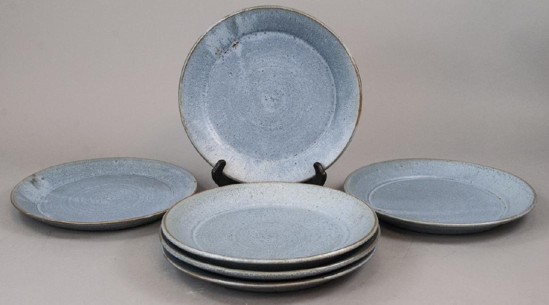 Set Of Six Blue Seagrove Plates: Set Of Six Blue Seagrove Plates, this set of plates all feature blue coloring and a earthenware glaze, all measured seagrove on bottom of the plate, the plates are measured at 10 inches