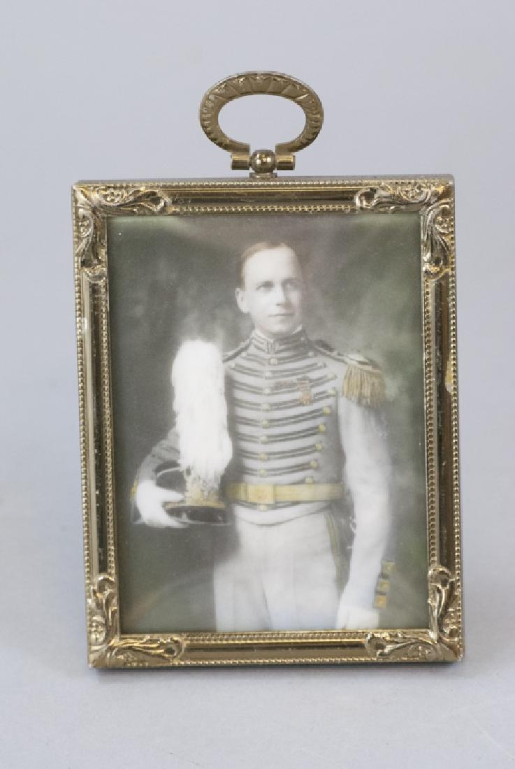 Antique Hand Colored European Solider Photograph: Antique Hand Colored European Solider Photograph in Ormolu Frame. Measures 5.5 x 3.5 inches.