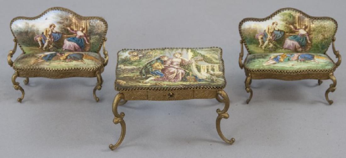 Antique Austrian Enamel Miniature Furniture: Antique Austrian Enamel Miniature Furniture. Dollhouse furniture. Table and pair of settees. Table measures 3.25 x 2.25 inches.