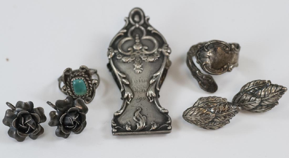 Assorted Antique & Vintage Sterling & Silver: Assorted Antique & Vintage Sterling & Silver. Large sterling clip from 1899, rings and earrings. Clip measures 2.5 inches in length.