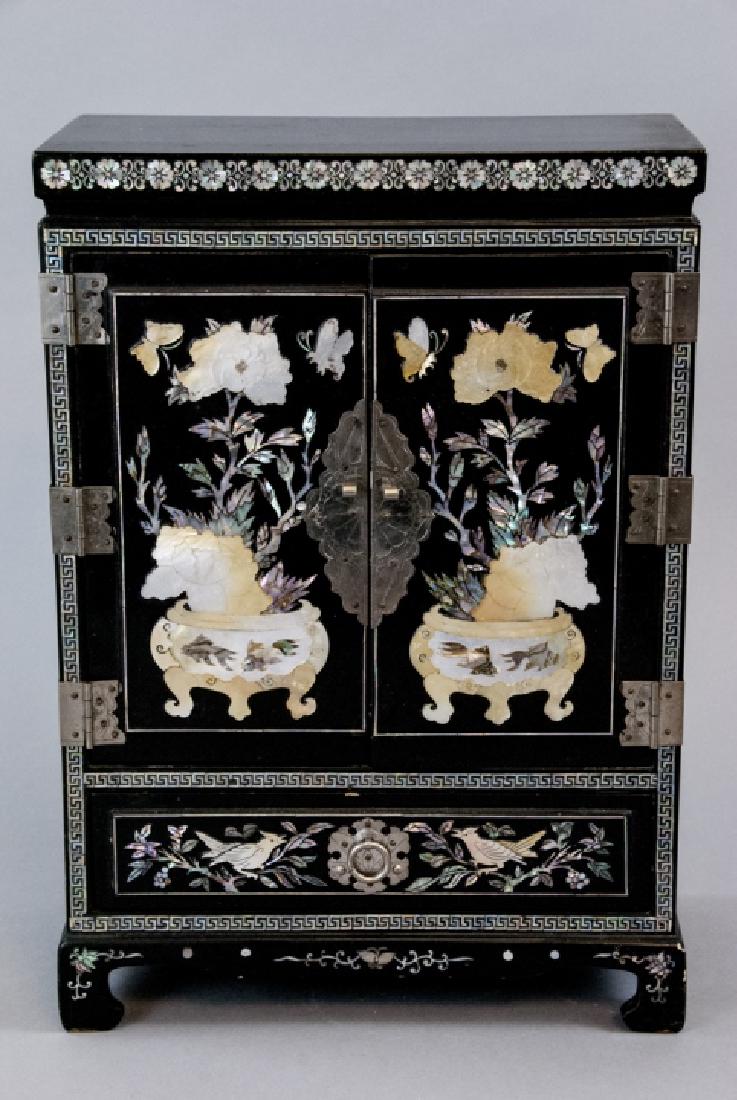 Chinese Inlaid & Lacquer Finish Jewelry Chest: Chinese Inlaid & Lacquer Finish Jewelry Chest. Mother of pearl and abalone inlay scenes of vases with flowers and butterflies. Measures 15.5 x10.5 x 6 inches.