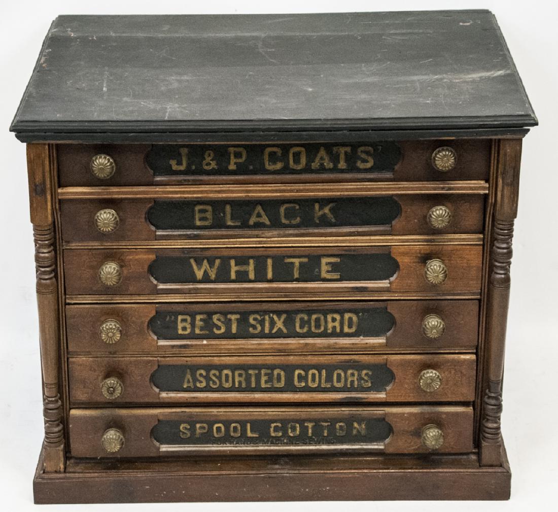 19th Century J & P Coats Storefront Cabinet: 19th Century J & P Coats Storefront Cabinet, this piece of furniture features a black top, 6 drawers all with text, the first drawers says J & P Coats, this was an old storefront organizational cabine