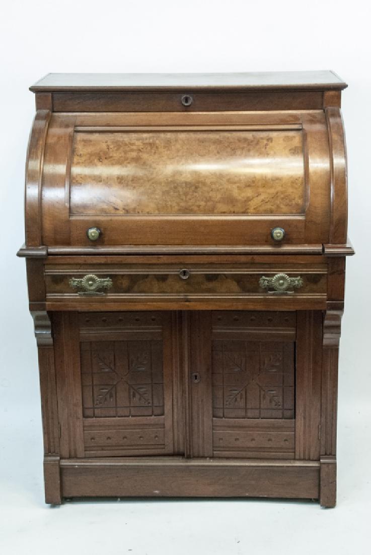Antique 19th Century Victorian Roll Top Desk: 19th Century Victorian Roll Top Desk, this desk is made out of burl walnut, it features pigeon holes inside the roll top, the desk is measured at 43 x 31.5 x 24 inches