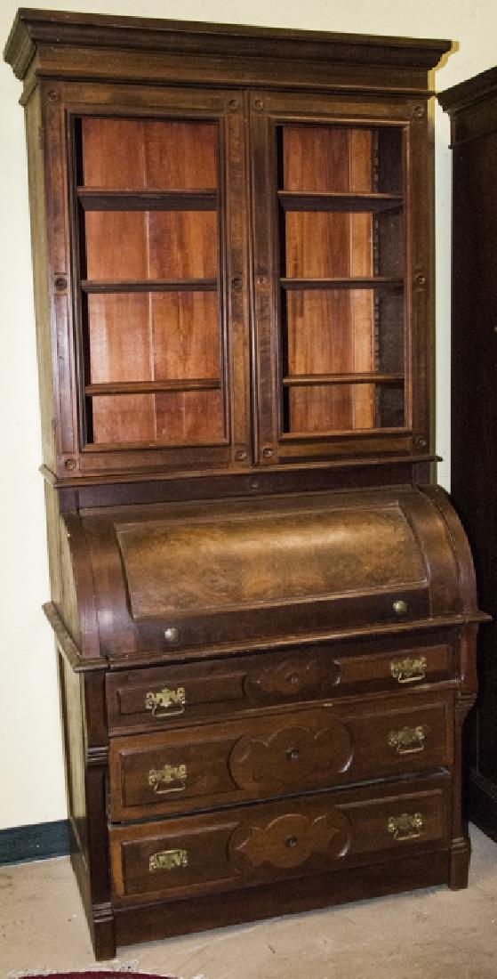 19th Century Victorian American Secretary Desk: 19th Century Victorian American Secretary Desk, this secretary desk features a cylindrical roll top desk, with a burl walnut veneer, the desk also features on the bottom half three drawers with keyhol