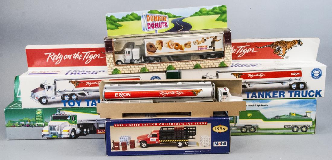 Assorted Lot Of Vintage Toy Tractor Trailers: Assorted Lot Of Vintage Toy Tractor Trailers, this lot features Hess tuck like toys from Exon, Mobil, BP and Dunkin Donuts from the years of 1990, 1992, 1996 and 1994