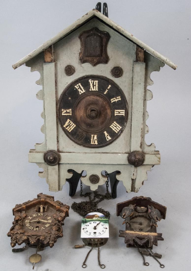 Group of Four Vintage Cuckoo Clocks (1 of 5)