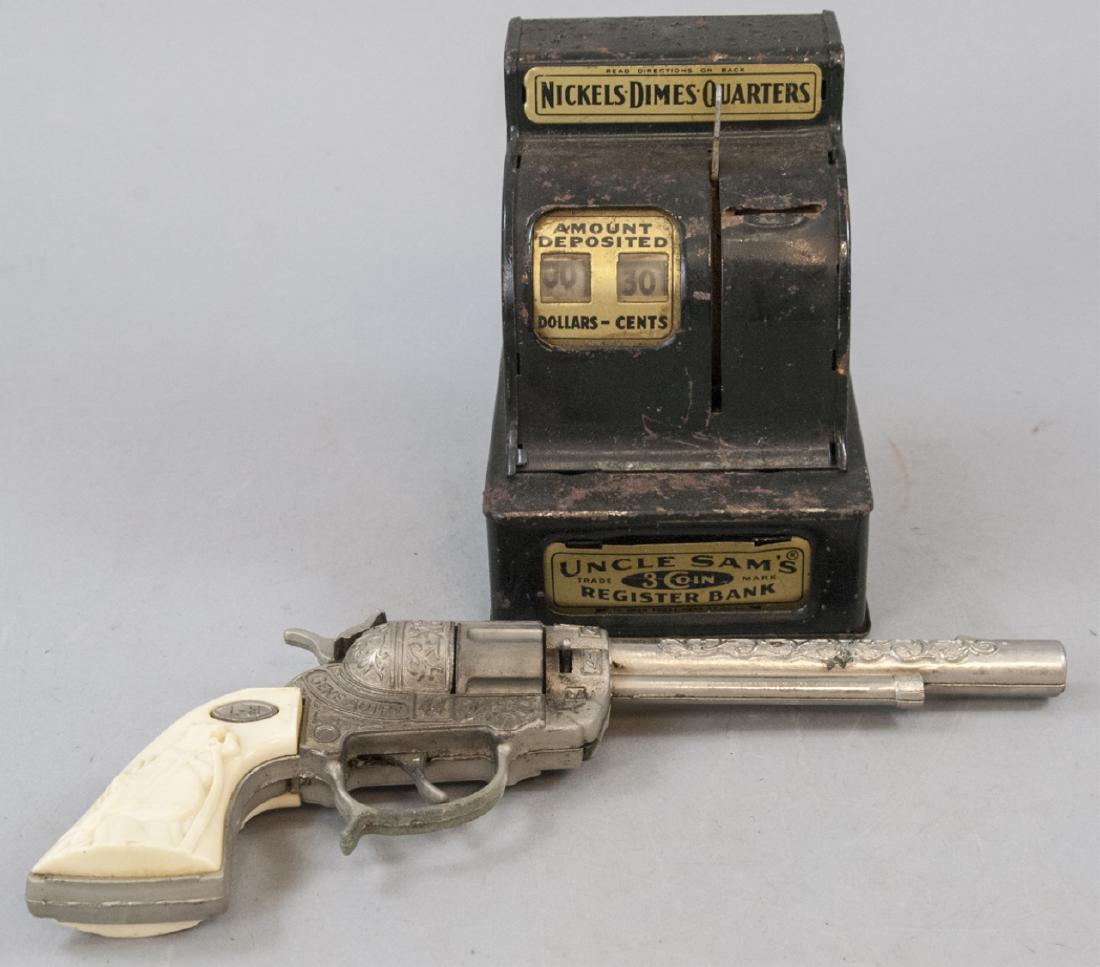 Antique Uncles Sams Registered Bank & Cap Gun: Antique Uncles Sams Registered Bank & Cap Gun, this lot features and Uncles Sams Registered 3 Coin Piggy Bank, and a rare Leslie Henry Gene Autry Nickel Plated cap gun, the largest is measured at 6 x