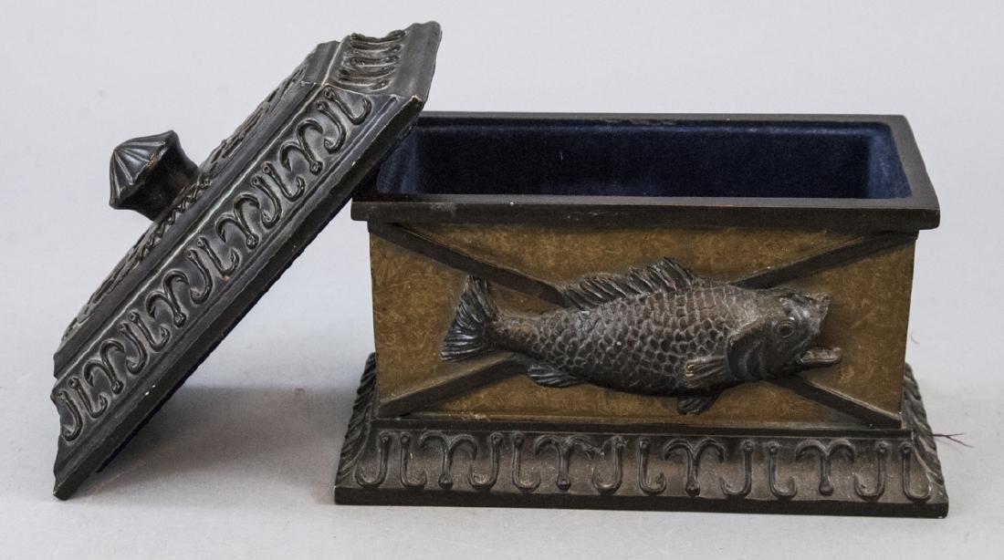 Antique Resin Fish Decorative Box W/ Lid: Antique Resin Fish Decorative Box W/ Lid, this decorative box seems to be made out of resin and features a fish on both sides of the box with a hook design around the top and bottom borders of the box