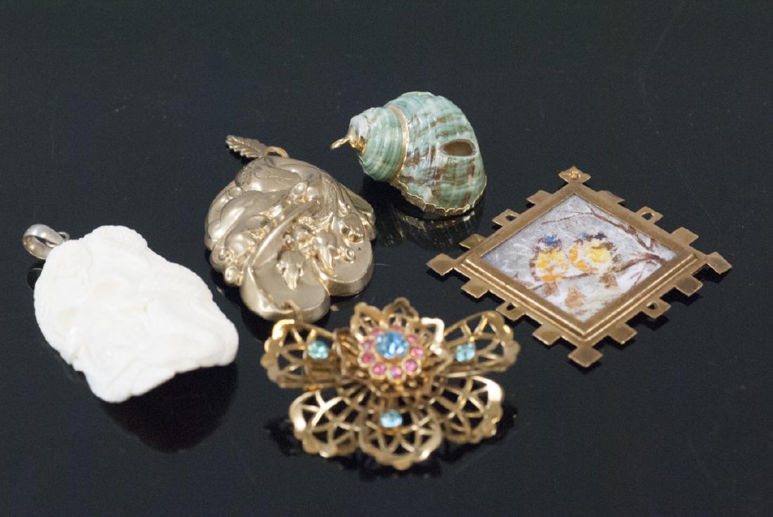 Group of Antique & Vintage Necklace Pendants: Group of Antique & Vintage Necklace Pendants. Victorian gold filled, carved bone snake and human skull pendant, sea shell, etc.