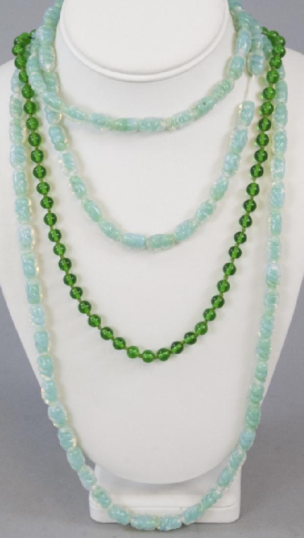 Antique Opaline Glass & Art Glass Necklace Strands: Estate Flapper Era Antique Opaline Glass & Art Glass Necklace Strands. Hand knotted jade color glass and dimpled opaline glass. Longer measures 60 inches in length.