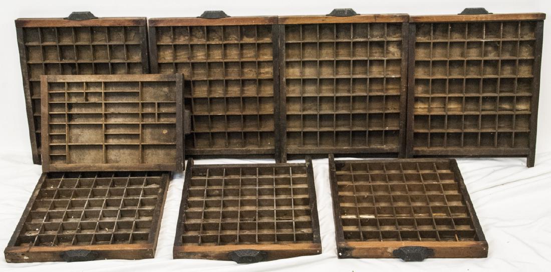 9 Antique Printers Letterpress Letter Trays: 9 Antique Printers Letterpress Letter Trays. Also has partial hardware to assemble into a cabinet. Carries the Stong Slat trademark. There is one smaller Hamilton drawer included. Drawers measure 18 i