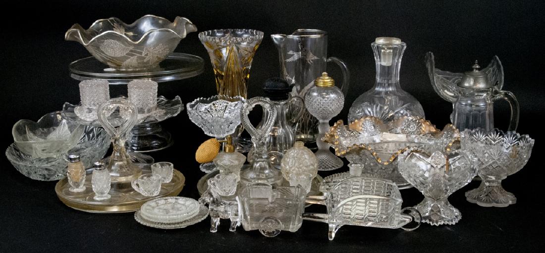 Assorted Crystal & Glass Kitchen & Home Items: Assorted Lot Of Crystal & Glass Kitchen/Home Items, this lot features a variety of different shaped and sized crystal and glass items for kitchen and home, this lot includes various cake stands, conta