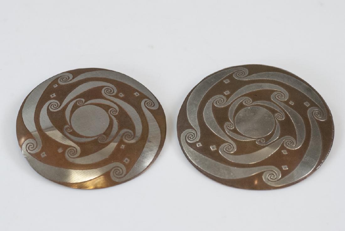 Pair Vintage Mixed Metal Copper & Silver Earrings: Pair Vintage Mixed Metal Copper & Silver Earrings. Possibly Native American or Mexican in origin. Each measures 2.25 inches in diameter.